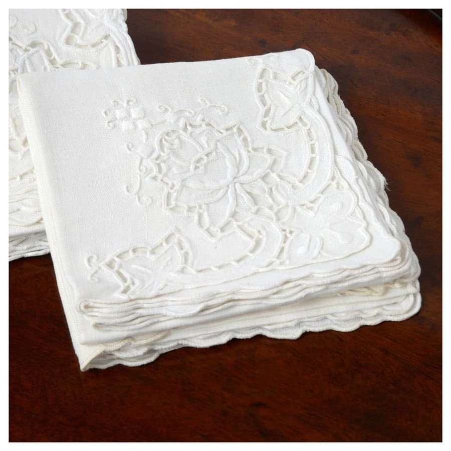 A set of 6 embroidered linen napkins