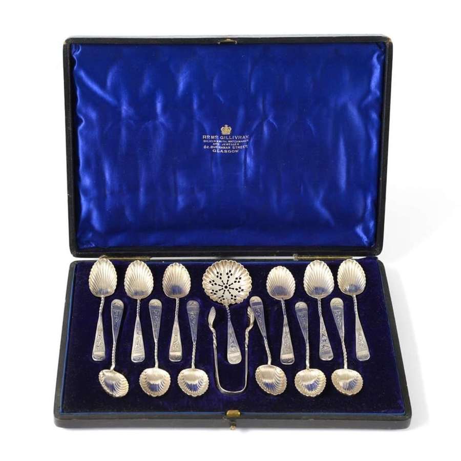 Cased set of spoons, tongs and sifter - by Henry Williamson