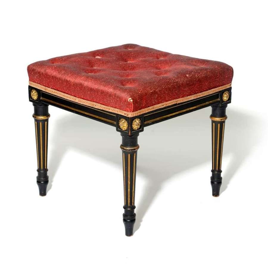 Ebonised and parcel gilt upholstered stool in the French style