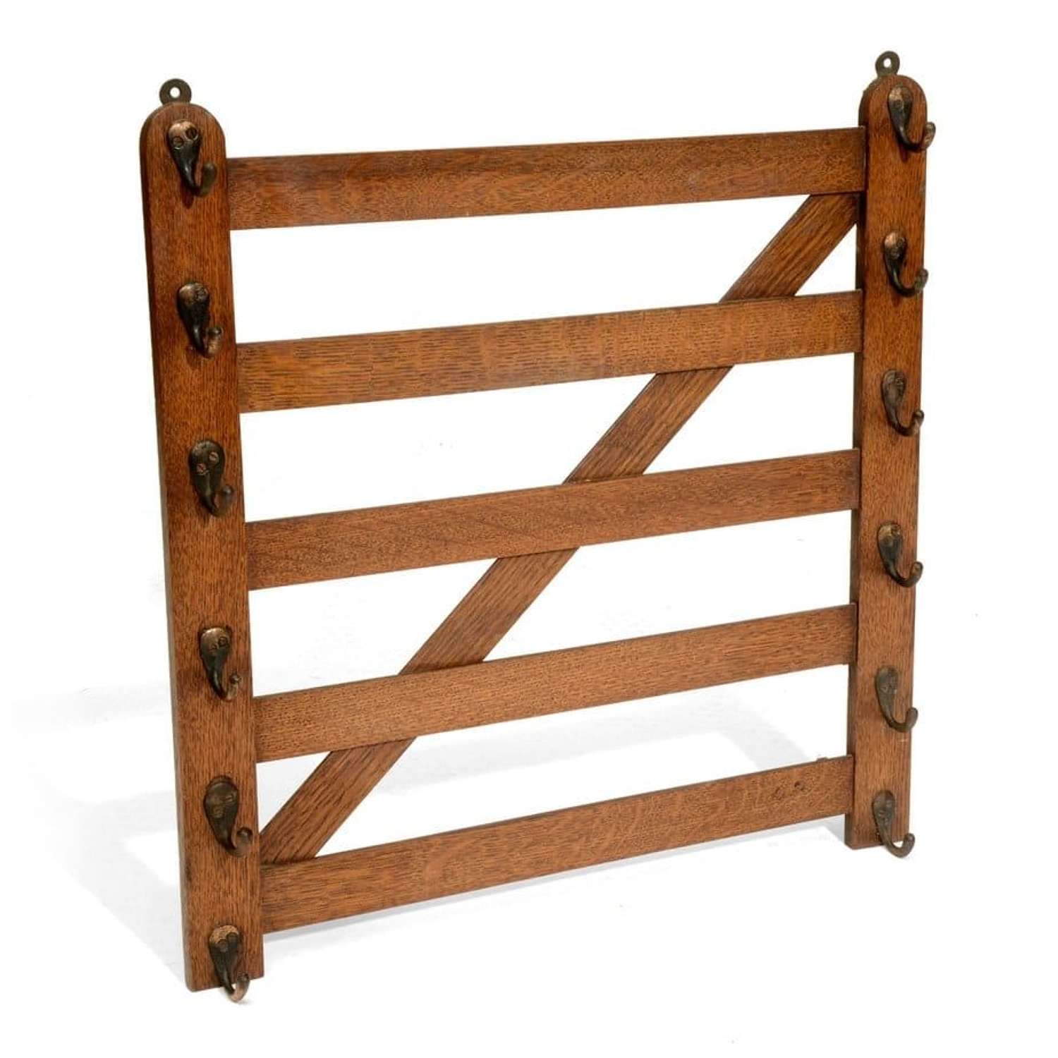 Oak whip-rack in the form of a 5 bar gate