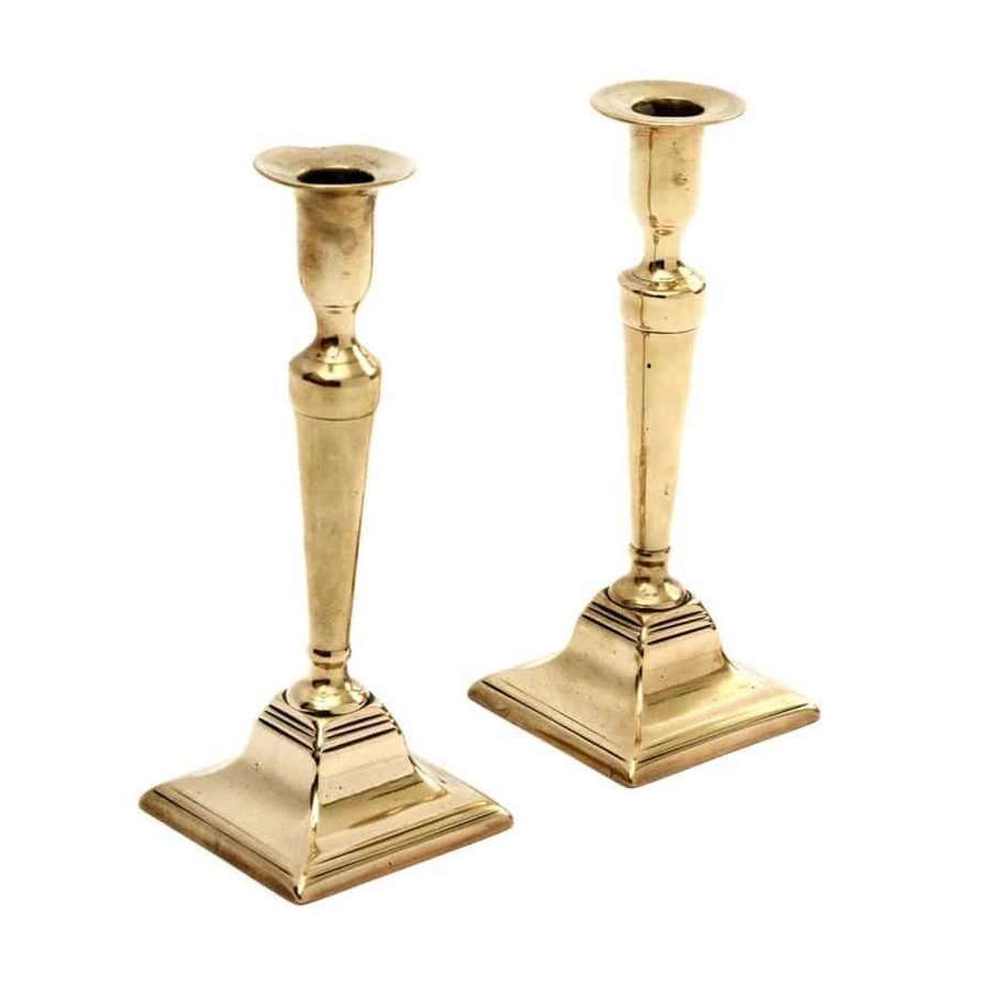 Pair of Georgian bell metal candlesticks