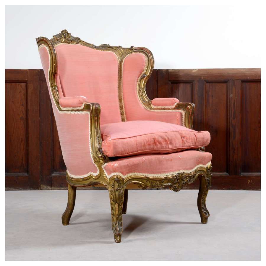 French Louis XV style gilt wing chair, or bergère