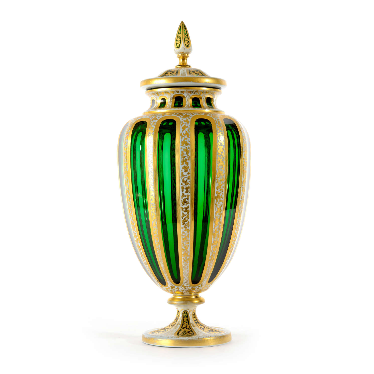 A stunning 19th Century Bohemian green glass overlay jar with cover.