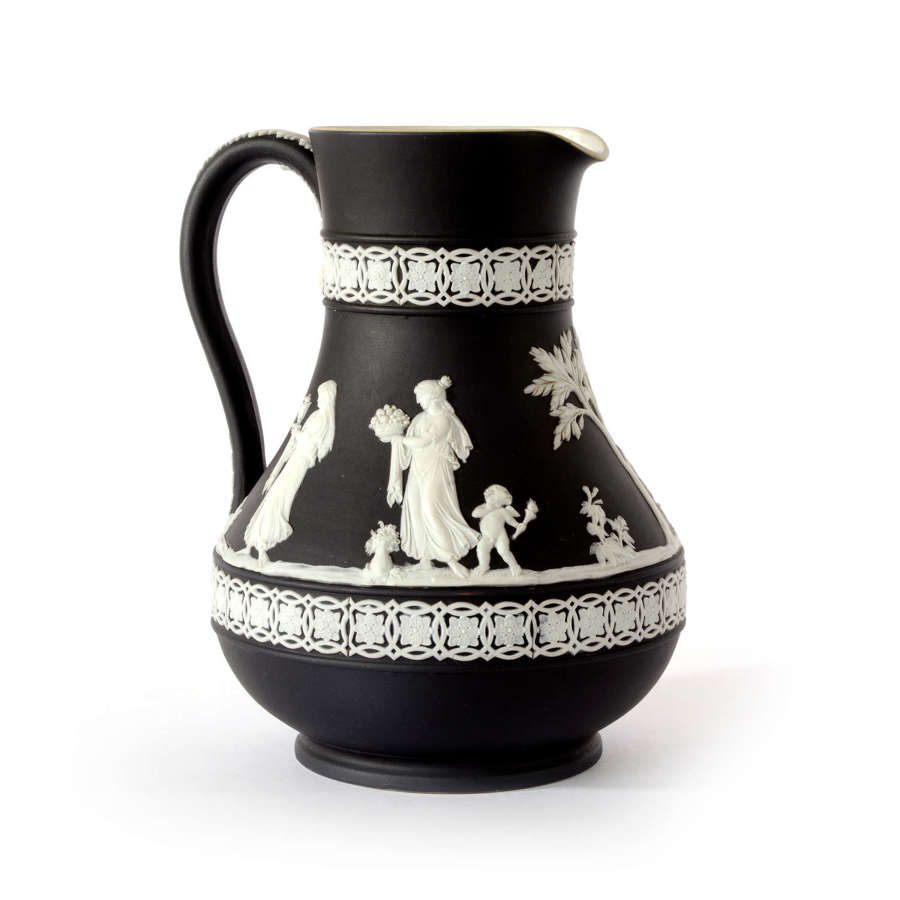 A striking late 19th/early 20th Century Wedgwood black Jasperware jug.