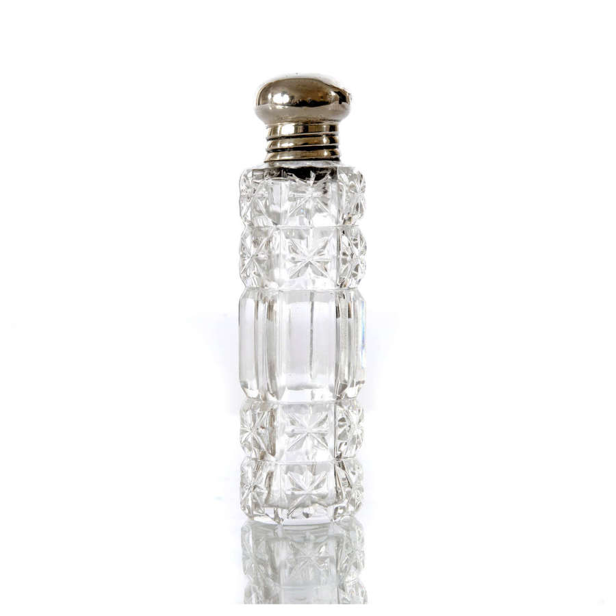 A charming Edwardian cut glass and silver scent bottle.