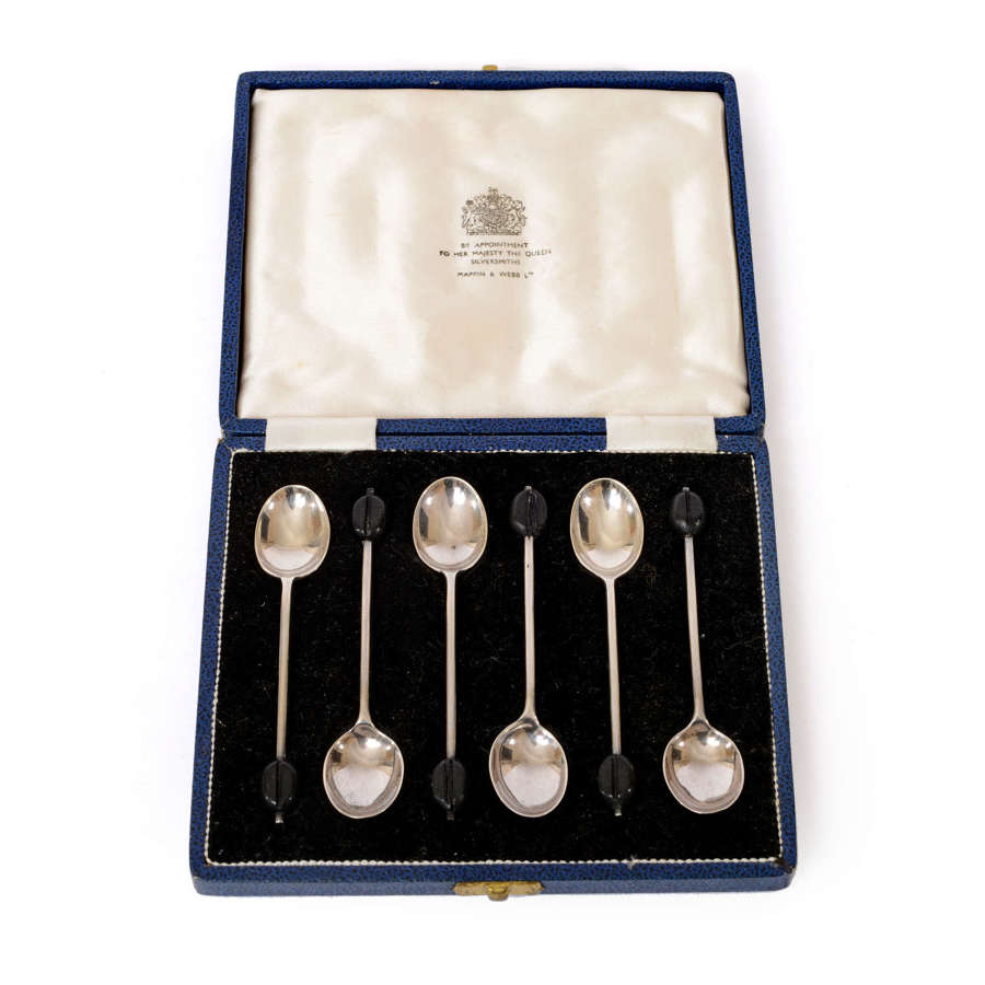 A set of 6 silver spoons with coffee bean terminals