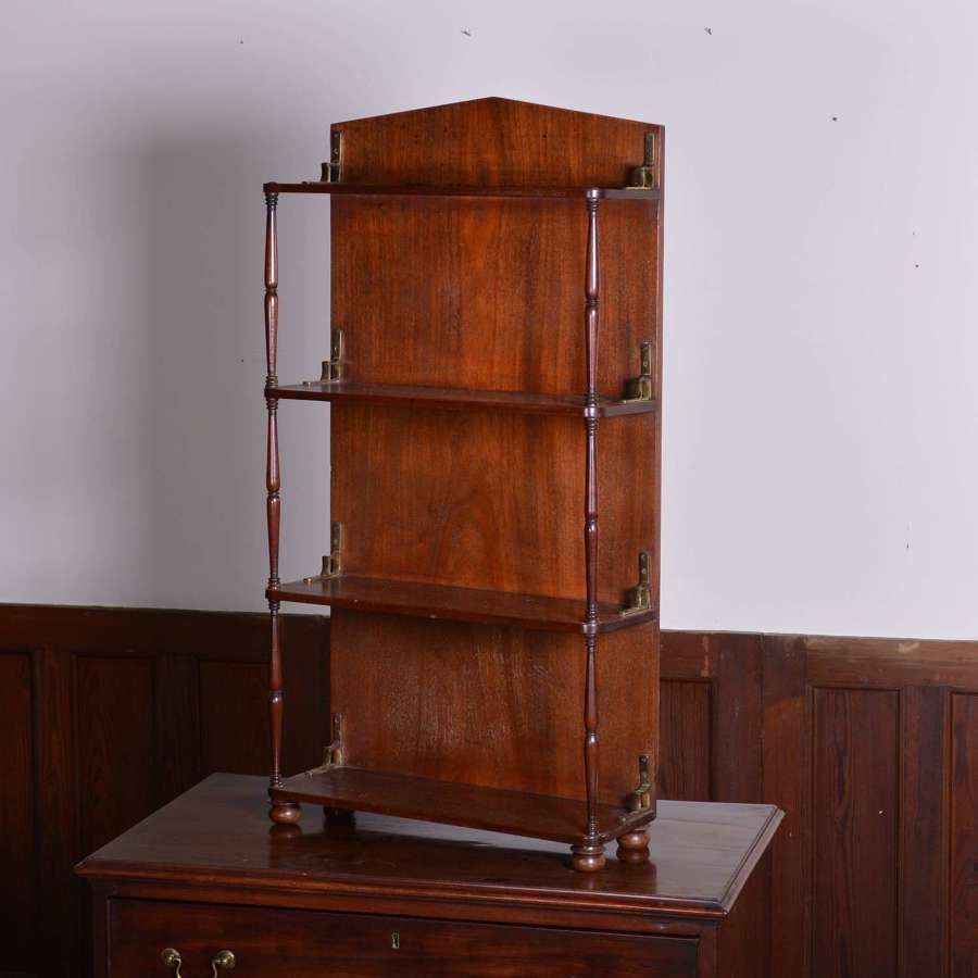 Mahogany shelves with fine well turned supports