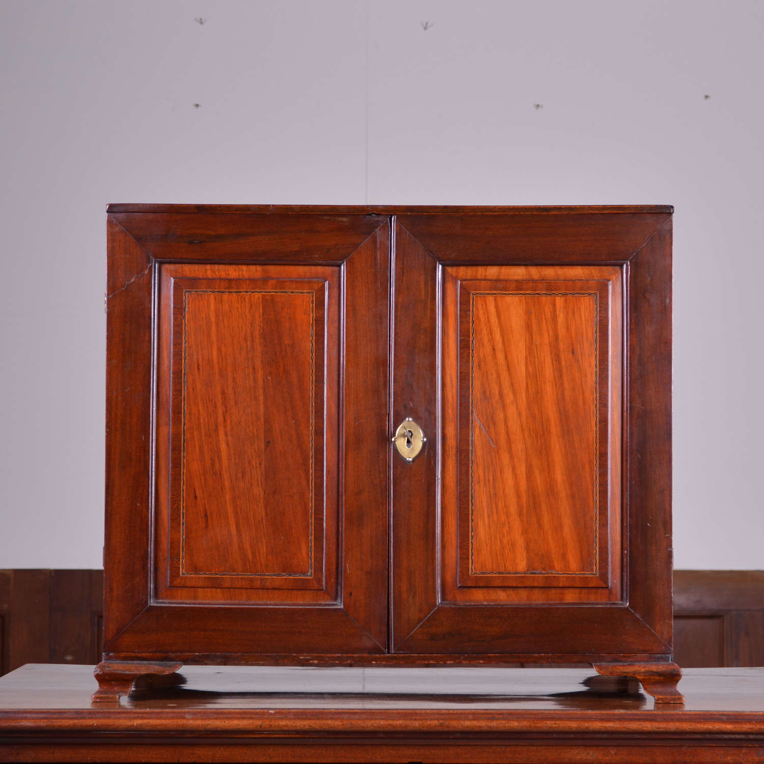 George II mahogany two door cabinet