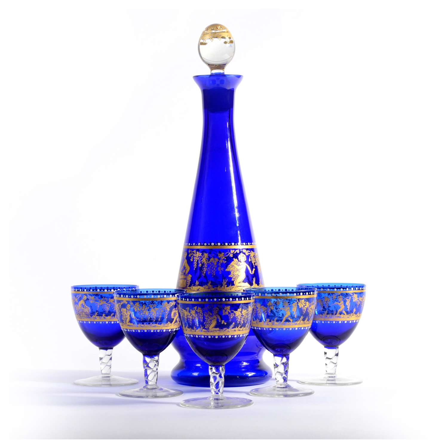 Venetian blue glass bottle and four glasses