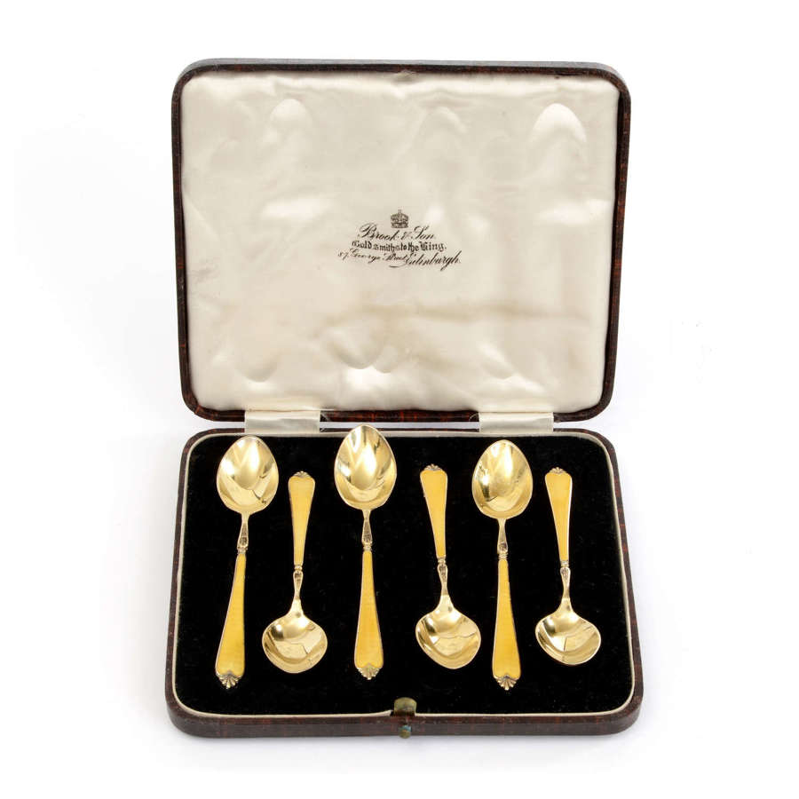 A Set of 6 Silver Gilt and Yellow Enamel Coffee Spoons