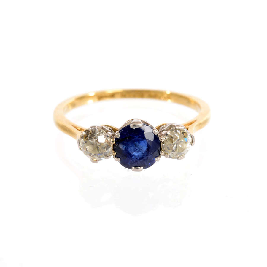 A Sapphire and Diamond Three Stone Ring