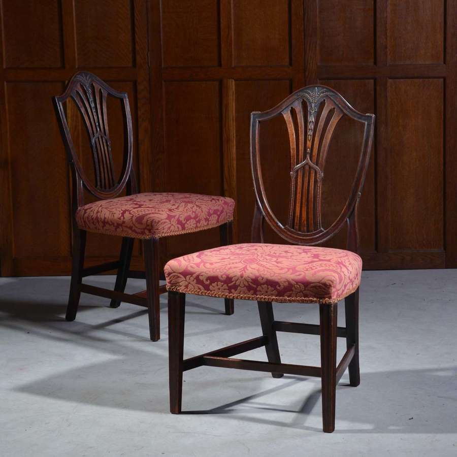 A Pair of Georgian Mahogany Hepplewhite Chairs