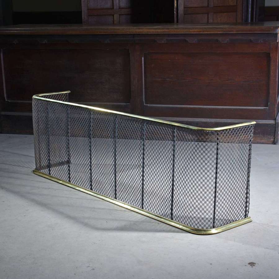 Large 19th century brass and wire fender